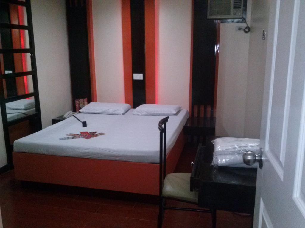 Hotel Sogo - Edsa, Pasay Harrison Манила Номер фото
